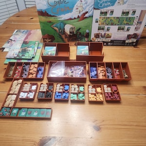 Creature Caravan Deluxe Edition STL Insert Files. Game not included