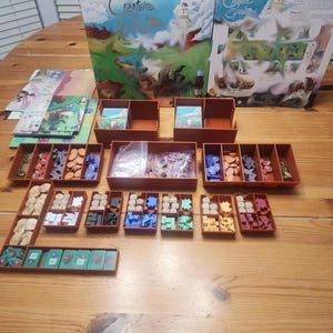 Unofficial Creature Caravan Deluxe Edition STL Insert Files. Game not included