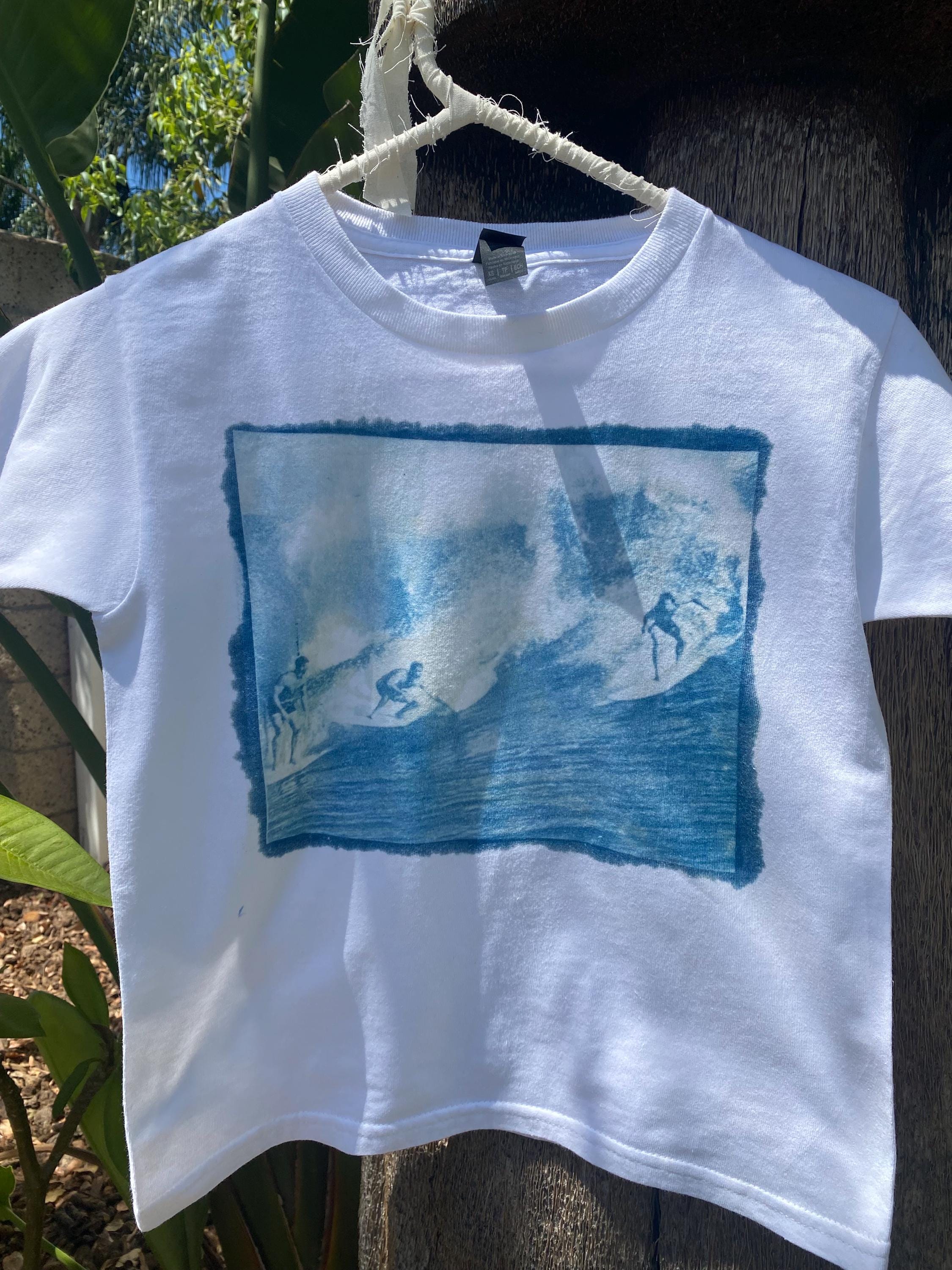 Surfer sunprinted babytee