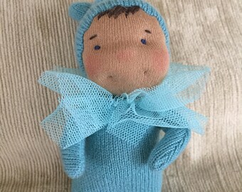 A Little Luvie in soft teal, Dark suntan skin, a Waldorf doll with wire frame, child safe, ready to ship, available for adoption