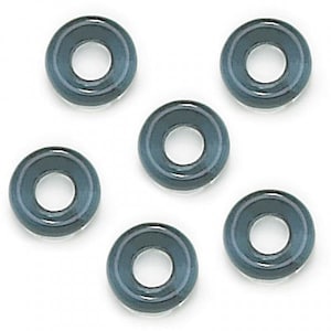 May include: Six dark gray, circular beads with a hole in the center are arranged on a white background. The beads have a glossy finish and a raised outer edge. These beads could be used for jewelry making or other craft projects.