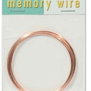 May include: A roll of copper-plated memory wire. The wire is coiled into a circle and is ready to be used for crafting.