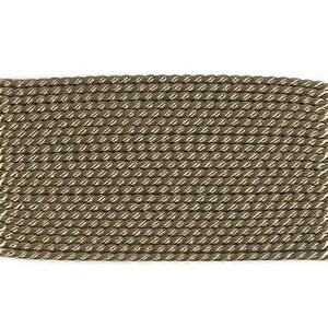 May include: A close-up of a brown braided rope trim. The rope is made of a woven material and has a subtle sheen.