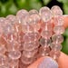 thumbnail image 2 of Natural Pink Cat's Eye Calcite Selenite Round Beads Loose 6/8/10/12/14mm 2 of 6