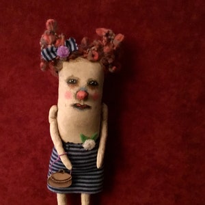odd doll , a weird art doll , sandy mastroni  , buttons and pom poms ,weird doll, bizarre ,spooky odd