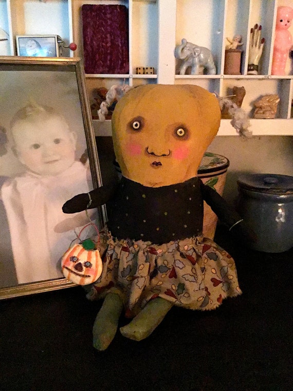 halloween doll on the shelf