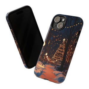 May include: A black phone case featuring a winter scene of a city street with a lit Christmas tree and snow on the ground.