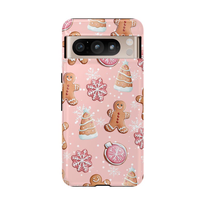 Pink phone case with charming gingerbread cookies and Christmas decorations.