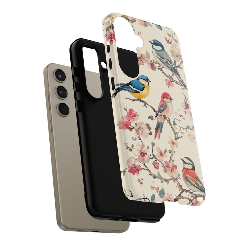 Soft watercolor-style birds perched on floral branches, a romantic spring-themed phone case.