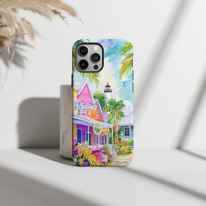Coastal art phone case featuring the iconic Key West lighthouse and lively island charm.