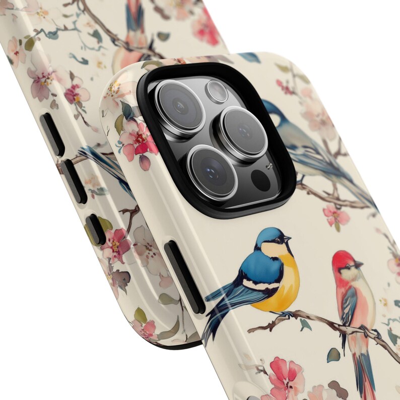 A beautifully designed floral and bird phone case that blends vintage charm with modern elegance.