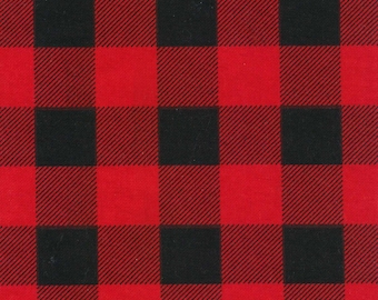 May include: Red and black buffalo plaid fabric. The fabric has a checkered pattern with alternating red and black squares.