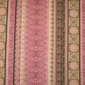 May include: A fabric featuring vertical stripes in pink, brown, and beige. The stripes display ornate floral and scroll patterns, with some stripes having solid colours and others with a black border. The design is symmetrical and detailed.