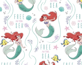 May include: A white background with a repeating pattern of Ariel, the Little Mermaid, swimming with Flounder. The pattern also includes seashells, starfish, seaweed, and the text "Free as the Sea".