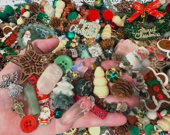 May include: A collection of Christmas-themed ornaments and decorations, including wooden stars, miniature Christmas trees, and a Santa Claus figure. The image also features the text "Merry Christmas".