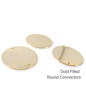 May include: Three gold-filled round connectors with two holes each. Gold Filled Round Connectors.