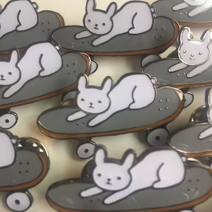 French bulldog on a skateboard enamel pin