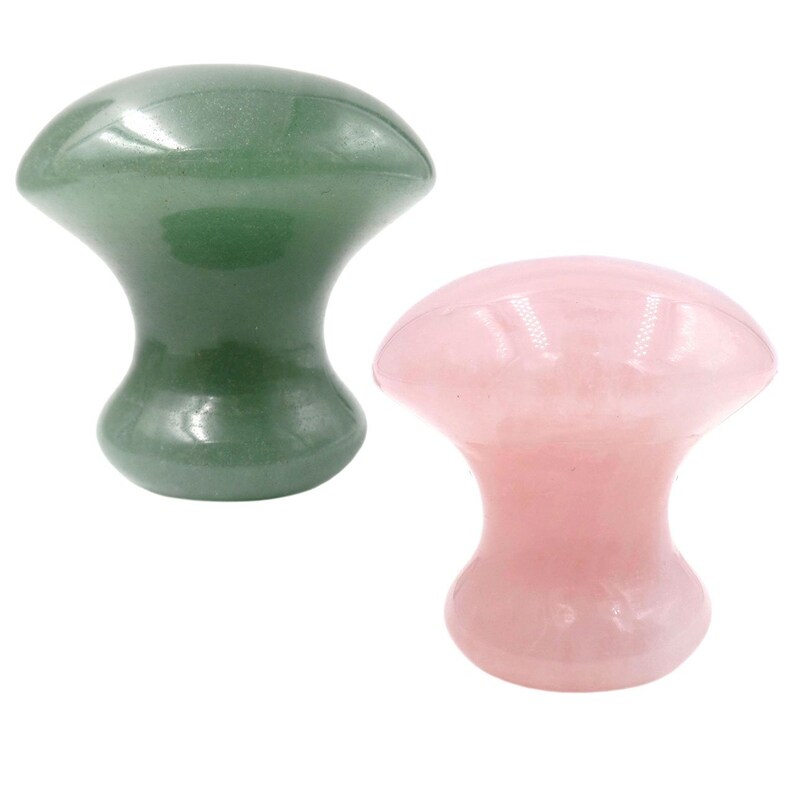 May include: Two jade rollers for facial massage. One is green jade and the other is pink.