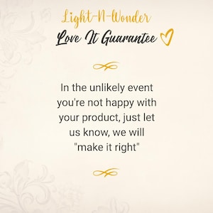 May include: A white background with gold floral designs and a gold infinity symbol. The text "Light-N-Wonder Love It Guarantee" is in black with a gold heart. The text "In the unlikely event you're not happy with your product, just let us know, we will "make it right"" is in black.