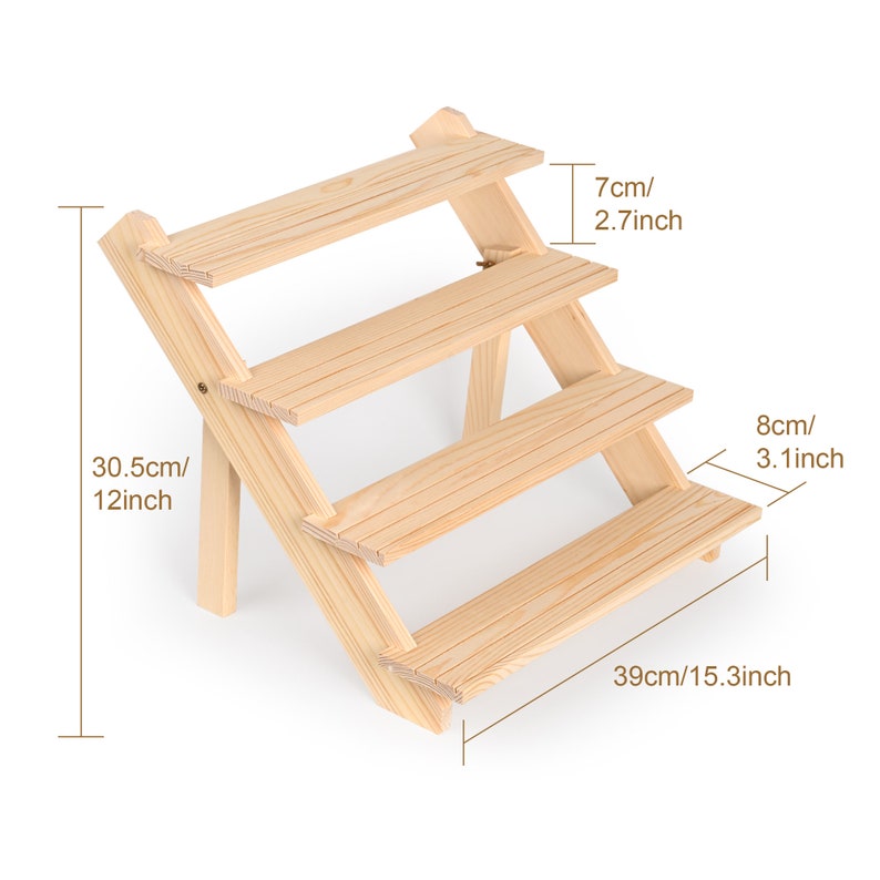 May include: A wooden tiered display stand with four shelves. The stand is 15.3 inches wide, 12 inches tall, and the shelves are 2.7 inches deep.