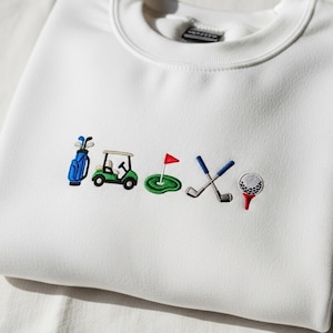 ゴルフアイコン刺繍スウェットシャツ、スポーティなゴルフクラブクルーネック、ゴルフカートボールティー、ゴルファーへのアスレチックギフト、彼女へのトレンディなサマーシャツ