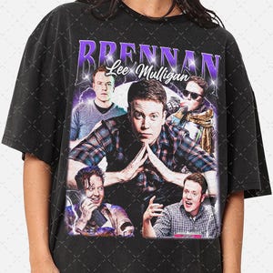 May include: Black t-shirt with a vintage-style graphic featuring the text "Brennan Lee Mulligan" and images of four people.
