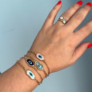 Warped evil eye bracelet in 14k goldfill image 1