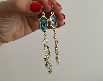 Blue evil eye dangles with star and pearl chain tassel fringe