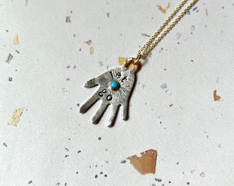 Handmade Let Go sterling silver hand with turquoise hamsa pendant