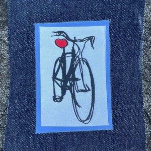 Iron-On Bicycle Patch Bike with Heart-Shaped Seat 3x2 image 1