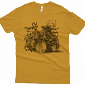 An octopus playing drums drawing screen printed onto a gold Tshirt.