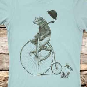Women's Frog on a bike shirt, printed on Next Level Tees