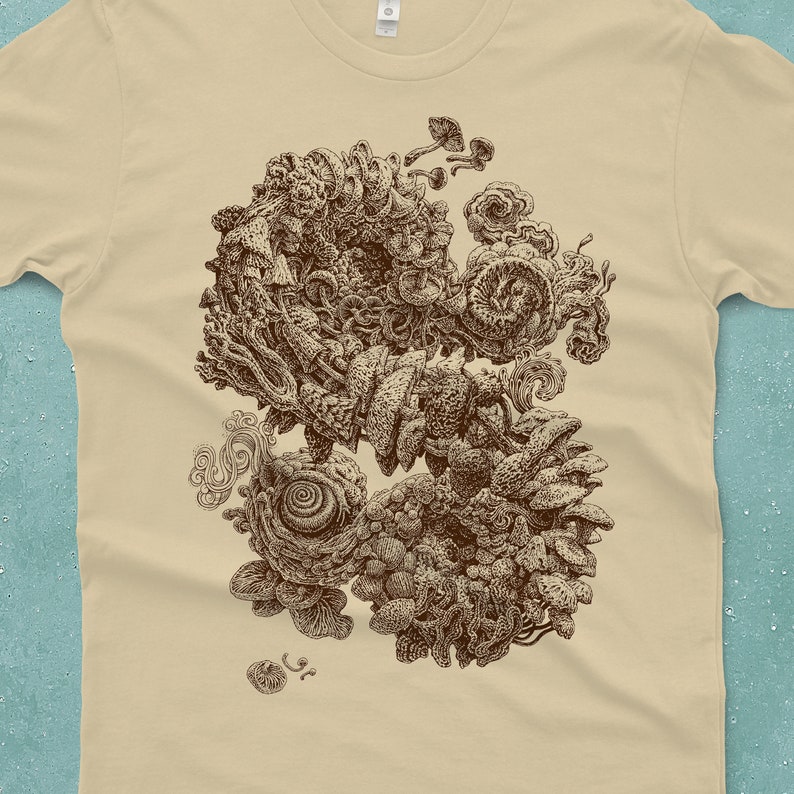 A Mens Mushroom T-shirt printed on 100% Cotton cream colored tee. An intricate screen print of mushrooms drawn by artist Michael Phipps.