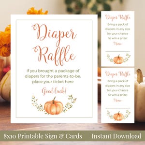 May include: A printable sign and cards set for a diaper raffle. The sign features the words "Diaper Raffle" in a decorative font, along with instructions and a pumpkin illustration. The cards have the same design. The sign is 8x10 inches.