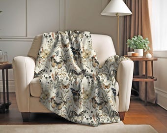 Manta vintage con mariposas: decoración de cabañas estilo cottagecore