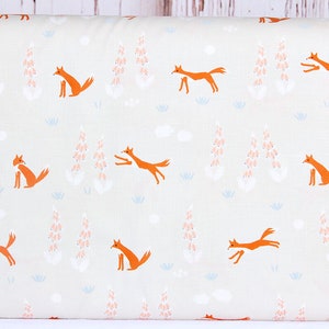 May include: A light gray fabric with a repeating pattern of orange foxes and pink flower clusters. The foxes are in various poses, some running, some sitting, and some jumping. The background is a light gray with a subtle texture.