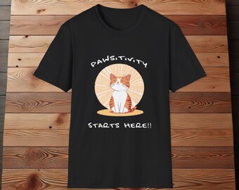 May include: Black t-shirt with a graphic of a cat sitting in a sunburst with the text "PAWSITIVITY STARTS HERE!!"