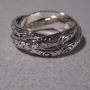 New Leaf ... Rolling  Ring ... Sterling Silver ... CooL ...