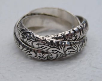 Petite Flower ... Rolling Ring ... Sterling Silver ... CooL ...