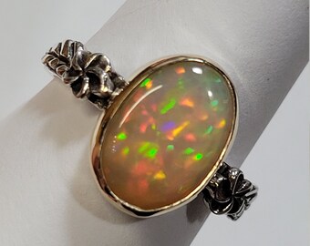 Ethiopian Opal Ring . Sterling Silver  & 14 K Yellow Gold . size  7 .  B217