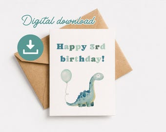 May include: A birthday card with a watercolor illustration of a blue dinosaur holding a balloon. The card reads "Happy 3rd birthday!" in blue and green lettering. The card is on a brown envelope.