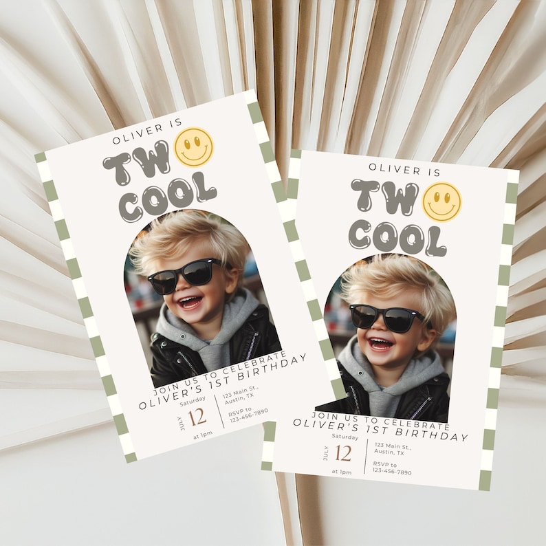 May include: A white and green birthday invitation with a photo of a boy wearing sunglasses. The invitation says "Oliver is Two Cool" with a yellow smiley face. The text also includes the date, time, and location of the party.