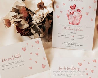 May include: A pink and white baby shower invitation with a cupcake illustration and the text "a little sweetheart is on the way". The invitation includes the name "Madison Wilson" and details for the event, including the date, time, and location. There are also two smaller cards, one for a diaper raffle and one for a book request for the baby.