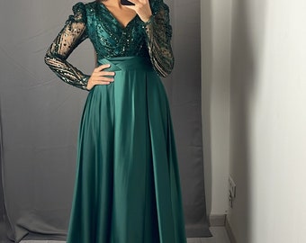 Long emerald green evening dress with long flared satin sleeves