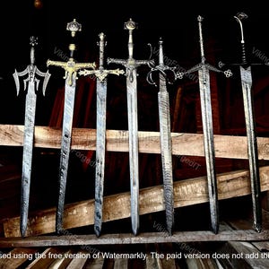 May include: Six ornate swords with detailed hilts and blades are displayed against a dark background. The swords vary in design, with intricate patterns and decorative elements. The blades have a textured appearance, and the swords are arranged on a wooden structure.