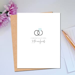 Tarjeta de felicitación de boda para pareja en el día de la boda con anillos Felicitaciones a los recién casados