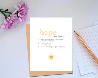 Definizione di Carta della Speranza: Carta positiva e premurosa per incoraggiare nei momenti difficili, promuovere la resilienza e un futuro più luminoso.