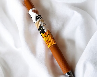 Woven refillable pen