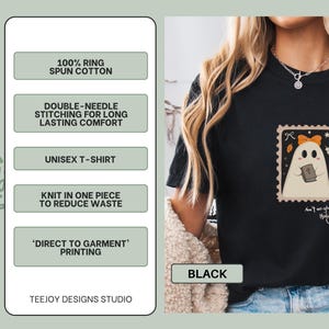 K&ouml;nnte beinhalten: Schwarzes Unisex-T-Shirt mit einem Geisterdesign in einem Briefmarkenrahmen. Der Geist tr&auml;gt eine orangefarbene Schleife und h&auml;lt ein Buch. Der Text auf dem Shirt lautet "Ain't no ghost like the Holy Ghost".