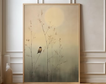 May include: A framed art print featuring a small bird perched on a delicate branch. The artwork has a soft, muted color palette with a large, glowing sun in the background. The overall aesthetic is serene and natural, evoking a sense of calm.